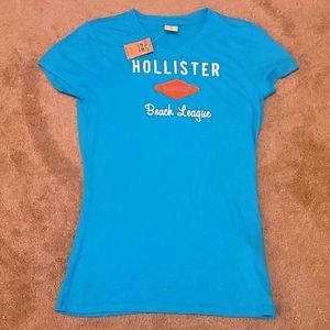Hollister brand junior T-shirt.. Bright blue. Size large.   new with tags